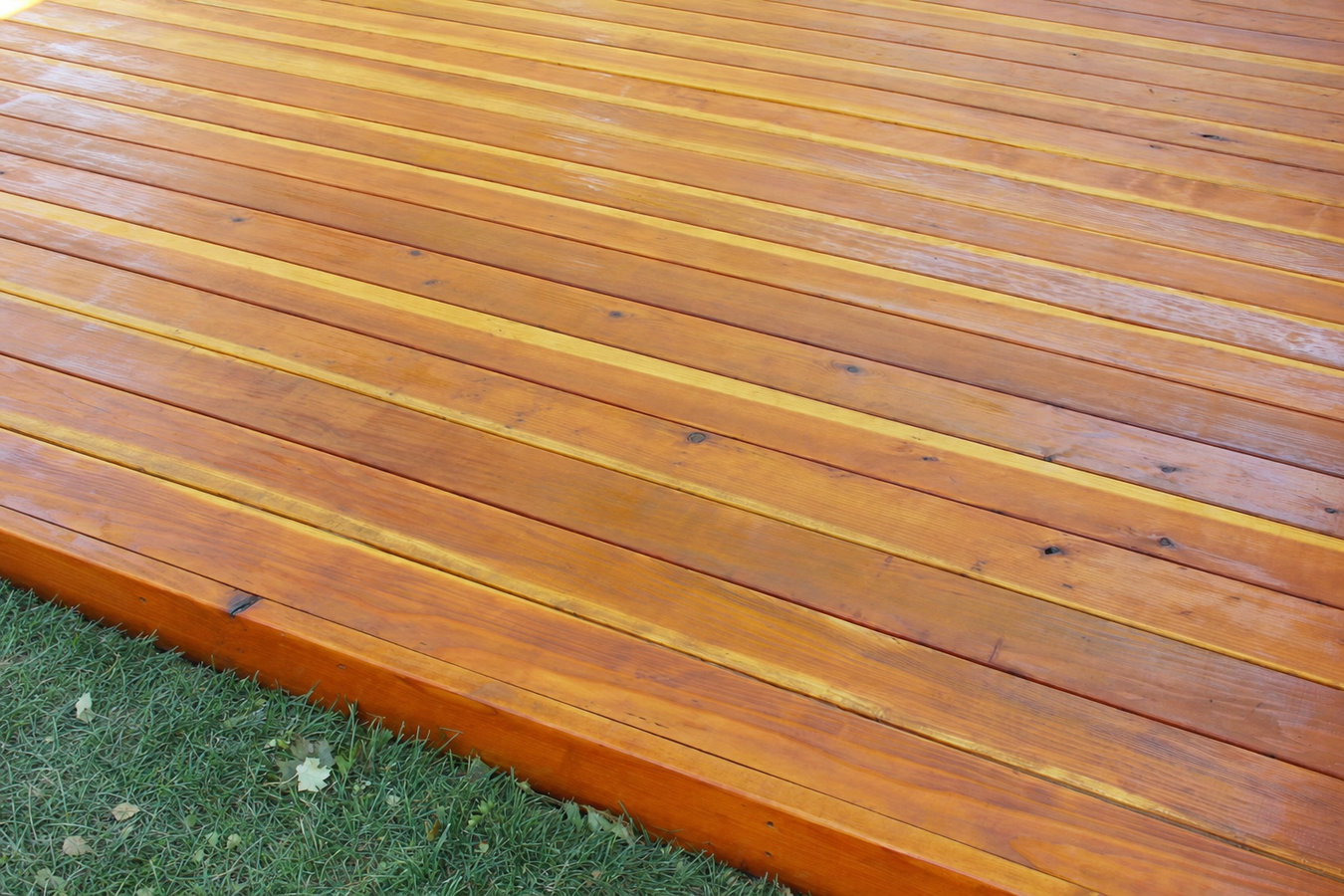 Deck staining and sealing